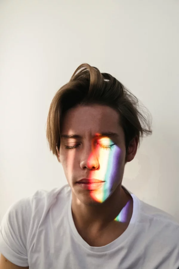Man with rainbow on his face